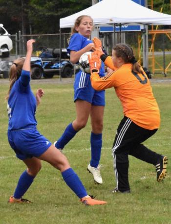 Goalie Lily Souza, left, recorded 17 saves for the Wolverines vs. the Roadrunners. PHIL DI VECE/Wiscasset Newspaper