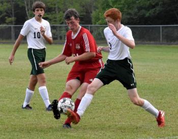 Brian Foye is pictured with Carrabec’s Vern Worthen, left, and Luke Carey. PHIL DI VECE/Wiscasset Newspaper