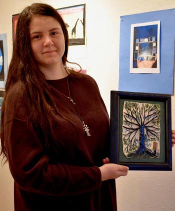 WMHS student Enya Waterbury poses with her ceramic work. PHIL DI VECE/Wiscasset Newspaper