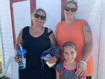 Sherry Scott, daughter Aryanna, 7, and their friend and fellow Alna resident Teresa Williams walked the speedway track in the fundraiser. SUSAN JOHNS/Wiscasset Newspaper