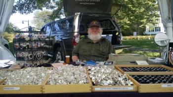 Terry Strickland of Karrottop Jewelry has been coming to the Arts & Crafts Shows on the Boothbay Common for nearly 20 years. MARGARET HOFFMAN/Boothbay Register Terry Strickland, Karrottop Jewelry