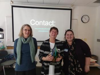 AATF-Maine Vice President Margot Stiassni-Sieracki, left, and AATF-Maine President Nathalie Gorey, right, recognize Irene Marchenay, center, with a lifetime achievement award for her successful career as a French teacher in Maine, Nov. 2 at USM during the chapter’s fall meeting. Courtesy of AATF-Maine
