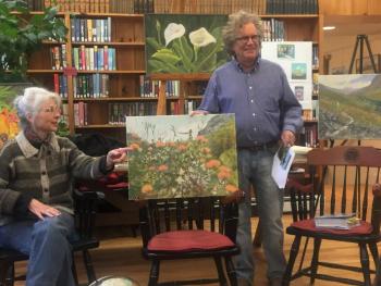 Illustrator-artists Lynne and John M.T. Seitzer show the painting that became the cover of “come walk in the Fynbos with me.” written by Susan Schadler. LISA KRISTOFF/Boothbay Register Lynne and John M.T. Seitzer