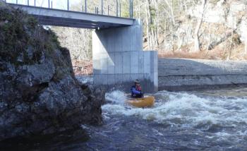 In Alna Dec. 15, Dresden’s Reid Anderson canoes Head Tide Dam’s widened opening. Courtesy of Catherine Kimball
