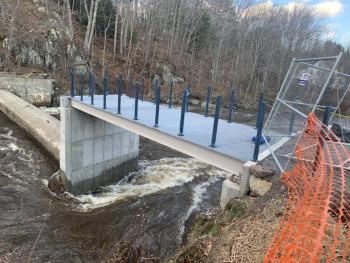 A river rushes through it Dec. 15. Above is the partly done railing ASF now hopes to finish this week. SUSAN JOHNS/Wiscasset Newspaper