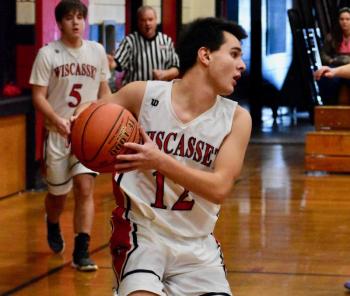 Matt Eckert comes away with a rebound early in the first half of Saturday’s game. PHIL DI VECE/Wiscasset Newspaper