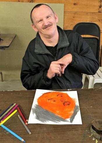 Ken Sproul and his " Self Portrait" at a Creative Expressions art group. Sproul’s work is in the “Art From the Heart” show at Miles’ Hall Gallery through Feb. 7. Eleanor Busby photo