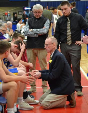 Boothbay coach I.J. Pinkham employed a zone defense and a patient offense Feb. 20 in hopes of upsetting Waynflete in the regional tournament for the second time in three years. KEVIN BURNHAM/Boothbay Register
