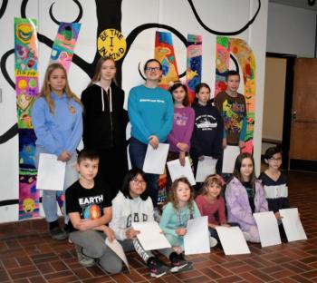 In attendance to receive their Certificates of Appreciation from the WJD Committee and their T-shirt designs Feb. 26 are: back row, left: Cassie Leeman, Maddie Orchard, Valerie Giles, Natalie Flagg, Meredith Ames and Mattias Fanslau; front from left: Ronan Drage, design winner Chau Nguyen, Pauline Nadeau Miller, Megan Higgins, Maya Jacobs and Gigi Blake. LISA KRISTOFF/Boothbay Register
