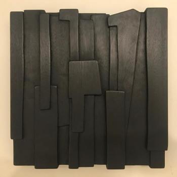 One in a series of seven mahogany, carved relief wall sculptures, 11” x 11” x 1” in the sunlight, by Eben Blaney. Eben Blaney.