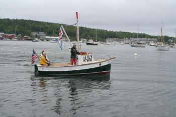 The Antique Boat Parade has featured many boats over the years, including this one built in 1910. File photo