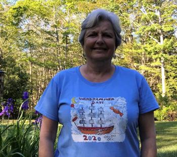 WIndjammer Days Committee member Mary Ripley models a short sleeve adult T on a fine sunny morning! Pete Ripley photo