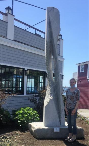 Bonnie Stover, general manager at Tugboat, graciously pose for a Kodak moment. LISA KRISTOFF/Boothbay Register