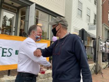 Ben Rines Jr., left, and Frank Barnako share an elbow bump. SUSAN JOHNS/Wiscasset Newspaper