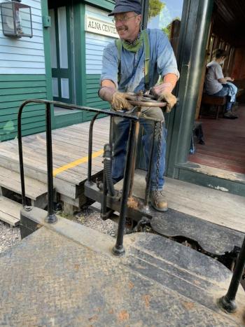 Volunteer Dana Deering helps work the train. SUSAN JOHNS/Wiscasset Newspaper