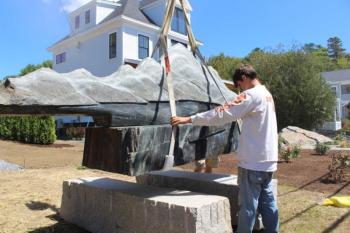 Readying Bill Royall’s “Mountain Lake” to be installed at its new location at Mama D’s at 50 Union Street. Sophie West photo