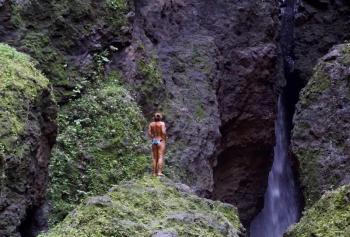 Solo sailor Holly Martin takes in the tropical environment inland on Nuku Hiva island in the Marquesas. Courtesy of Holly Martin