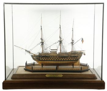 This cased fully-rigged Napoleonic prisoner-of-war ship model sold for $17,550. Courtesy of Carol Achterhof