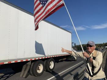 Edgecomb’s Stott Carleton returns a thumbs up Monday on Donald E. Davey Bridge. SUSAN JOHNS/Wiscasset Newspaper
