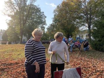 Wiscasset’s Sheila Sawyer, left, and Michelle Peele of South Bristol catch up at Scarecrowfest Oct. 10. SUSAN JOHNS/Wiscasset Newspaper
