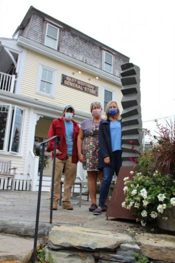 Robbie Campbell of Campbell Marine, Elizabeth Evans of the East Boothbay General Store, and Patricia Royall of Sculpture Boothbay post installation. Sophie West photo