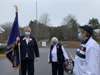 From left, auxiliary members Diane Munsey, Jane LeBourdais and Sandra Winters prepare for the ceremony. SUSAN JOHNS/Wiscasset Newspaper