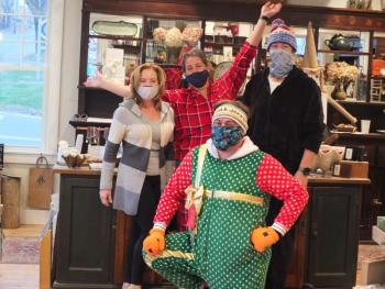 Ae Ceramics had a line waiting at the door before a 5 a.m., Nov. 14 start to the 32nd Early Bird Sale. Pictured, front, Mike Maxim. Back, from left, Lisa Best, Allison Evans and Chris Fritz. BILL PEARSON/Boothbay Register