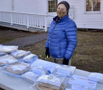 Martha Speed of Edgecomb mans the pie table. PHIL DI VECE/Wiscasset Newspaper