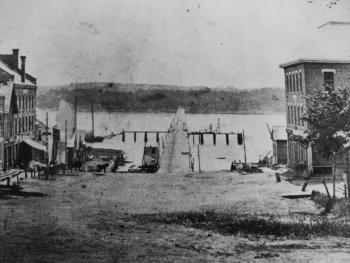 One of the oldest photographs of Wiscasset village taken not long after the Rundlett Block shown at the right was constructed in 1871, 50 years after the final edition of the Lincoln Telegraph was printed.
