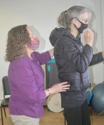 Chamber member Susan Robson tries a balance exercise. ART MAYERS/Wiscasset Newspaper