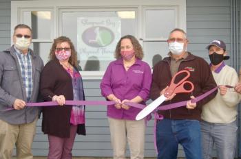 Wiscasset Town Manager Dennis Simmons, business member Janie Miller, Dr. Jean Beattie, chamber president Chip Davison and PTA Maureen Reed cut the ribbon. ART MAYERS/Wiscasset Newspaper