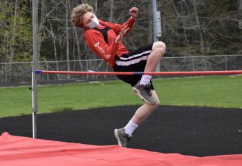 Cory Ricker high jumps. PHIL DI VECE/Wiscasset Newspaper