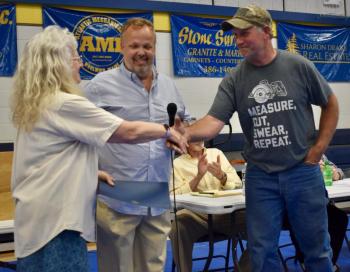 Selectmen Allison Hepler and Jason Shaw congratulate 2021 Spirit of America award recipient Matt Gagnon. PHIL DI VECE/Wiscasset Newspaper