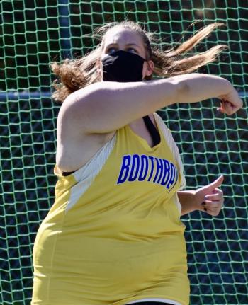 Marissa Davison launches a discus. PHIL DI VECE/Wiscasset Newspaper