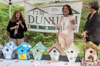 Gallery manager Kerry Hadley and season sponsor Sherri Dunbar were introduced by Wendy Ross at the Maine Art Gallery’s Members Show. Birdhouses decorated by artists were sold in a silent auction. Photo by Bob Bond