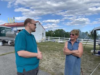 First Congregational Church of Wiscasset Pastor Josh Fitterling and Wiscasset Speedway co-owner Vanessa Jordan catch up. SUSAN JOHNS/Wiscasset Newspaper