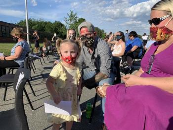 Senior Kailey Smiley’s sister Paisley Smiley, 3, their parents Shirley and David Smiley of Chelsea and, behind David and Paisley, David and Shirley’s daughter Chloe, 15, await the senior awards ceremony June 9 outside Wiscasset Middle High School. SUSAN JOHNS/Wiscasset Newspaper