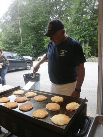 Bill Witzell flips pancakes. ART MAYERS/Boothbay Register