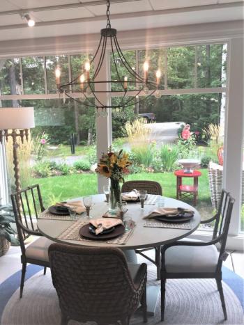 This dining room shows clients, chairs do not have to match. Here, two different styles complement and draw attention to their design elements. LISA KRISTOFF/Boothbay Register COVE by Knickerbocker Group
