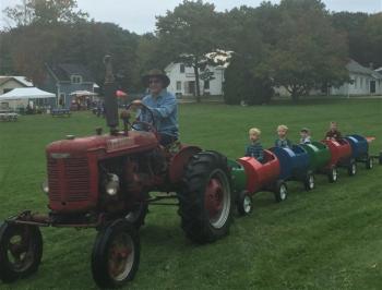 Kids love that barrel ride. Thanks, Ben Snead! LISA KRISTOFF/Boothbay Register