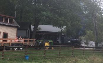Where pumpkin wagon and steam train intersect. LISA KRISTOFF/Boothbay Register
