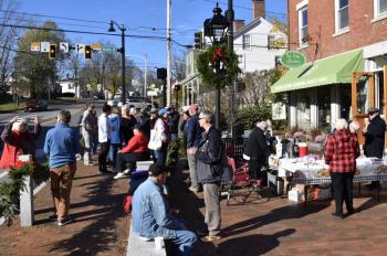 Downtown Wiscasset was a busy place Saturday with both the Early Bird Sale and holiday decorating taking place. PHIL DI VECE/Wiscasset Newspaper