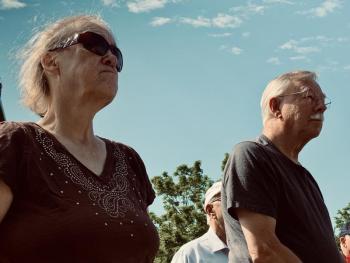 Post 54 member John Kennedy’s wife Edna Kennedy and Wiscasset’s Brian Adams observe the ceremony. SUSAN JOHNS/Wiscasset Newspaper