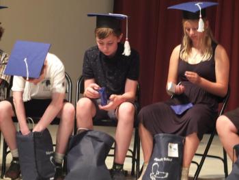 Edgecomb Eddy sixth grade graduates received class gifts ranging from star crayons to sunglasses. BILL PEARSON/Boothbay Register