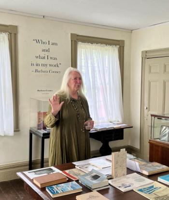 Exhibit organizer Alice Smith Duncan leads a tour of LCHA’s exhibit, Women Writers of Lincoln County, at the Old Jail in Wiscasset. Courtesy photo