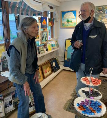 Anna Apollonio stops by Joy to the Wind on the east side and finds herself face-to-face with the “tiers of Dove chocolate,” standard fare at the gallery on First Fridays. Courtesy of Lynne Seitzer