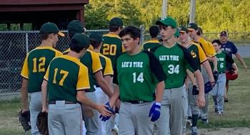 Cleyton Splaine (#17) shows sportsmanship with the Brunswick Babe Ruth Team. Lincoln defeated Brunswick 12-4 in Wiscasset. Shanon Cotta photo
