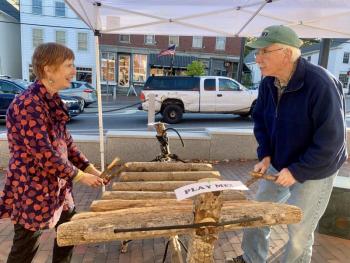 WAW organizer Lucia Droby and husband Rick Burns play an Amadinda. SUSAN JOHNS/Wiscasset Newspaper