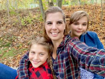 WES pre-K teacher Samantha Crawford with daughters Rosaria, left, and Angelina, right, last autumn. Courtesy of Samantha Crawford