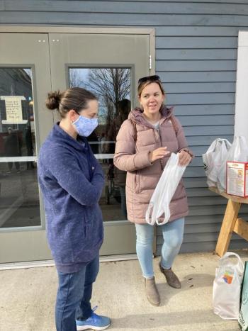 Food pantry volunteer Brie DiPerri and PIE Chair Wendy Tarrance. EDNA MILLER/Wiscasset Newspaper